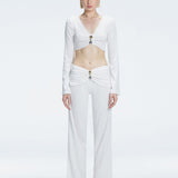 Sirenia White Long Sleeve Accessory-Detail Crop Top | Moeva | Crop Top | Each week unveils new pieces—luxury swimwear, fluid resort silhouettes, and elevated summer-to-evening essentials designed to carry you from coastal escapes to city nights.