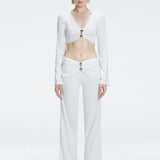 Sirenia White Long Sleeve Accessory-Detail Crop Top | Moeva | Crop Top | Each week unveils new pieces—luxury swimwear, fluid resort silhouettes, and elevated summer-to-evening essentials designed to carry you from coastal escapes to city nights.