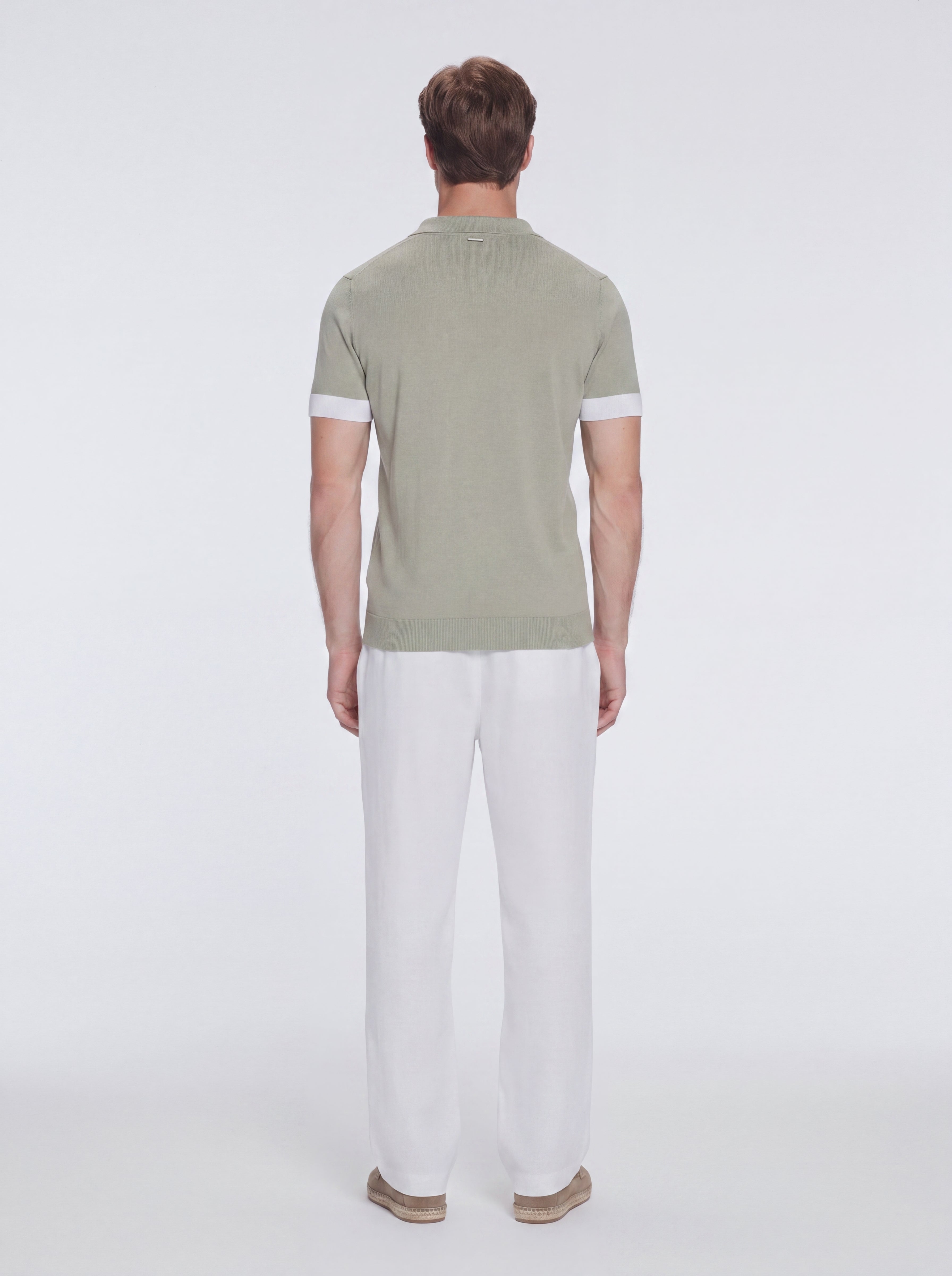 Troy Green/White V-Neck T-Shirt with Contrast Trim | Moeva | T-Shirt | Each week unveils new pieces—luxury swimwear, fluid resort silhouettes, and elevated summer-to-evening essentials designed to carry you from coastal escapes to city nights.