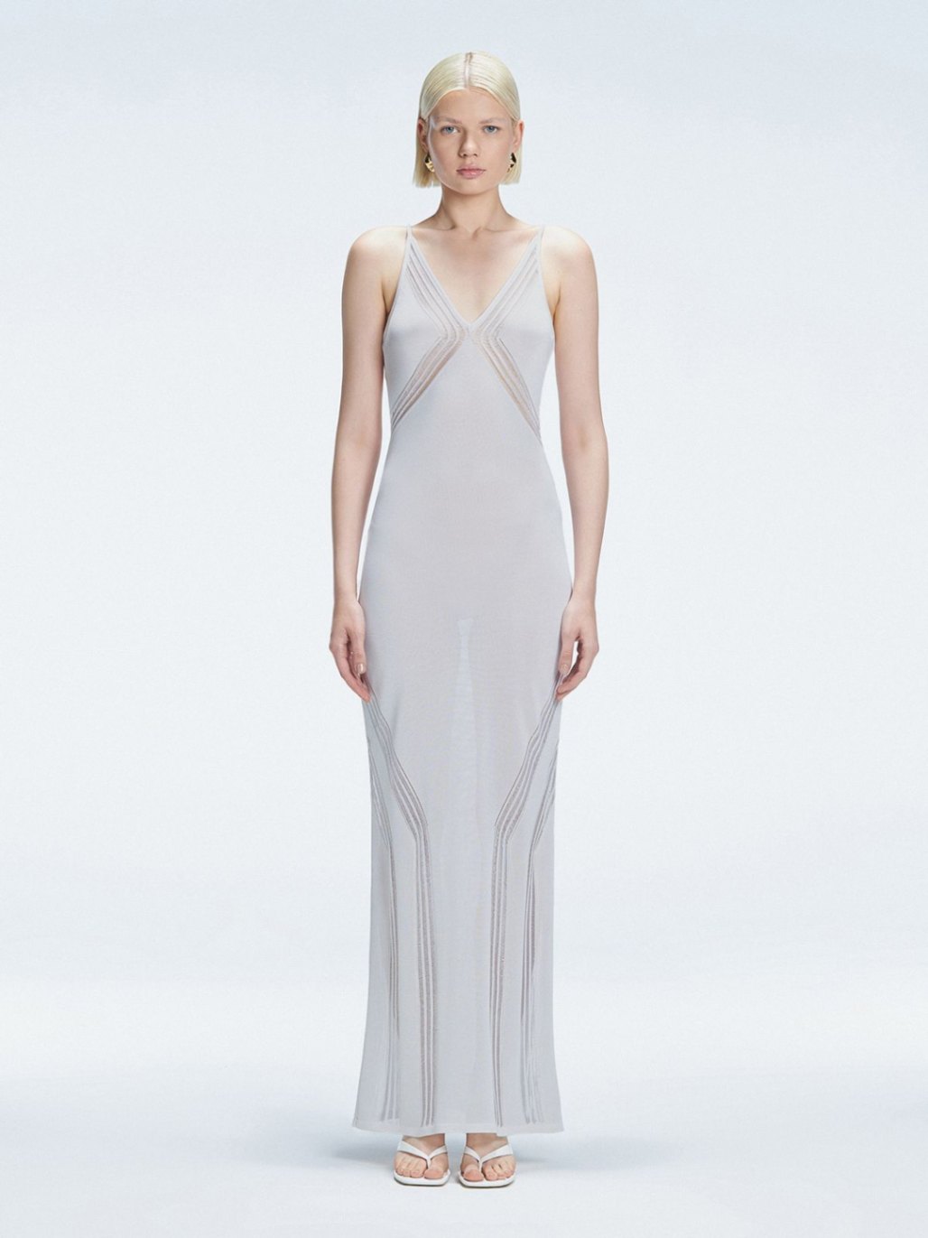 Ella Mendelsohn - Odessa Silver V Neck Knit Maxi Dress | Moeva | Dress | Each week unveils new pieces—luxury swimwear, fluid resort silhouettes, and elevated summer-to-evening essentials designed to carry you from coastal escapes to city nights.