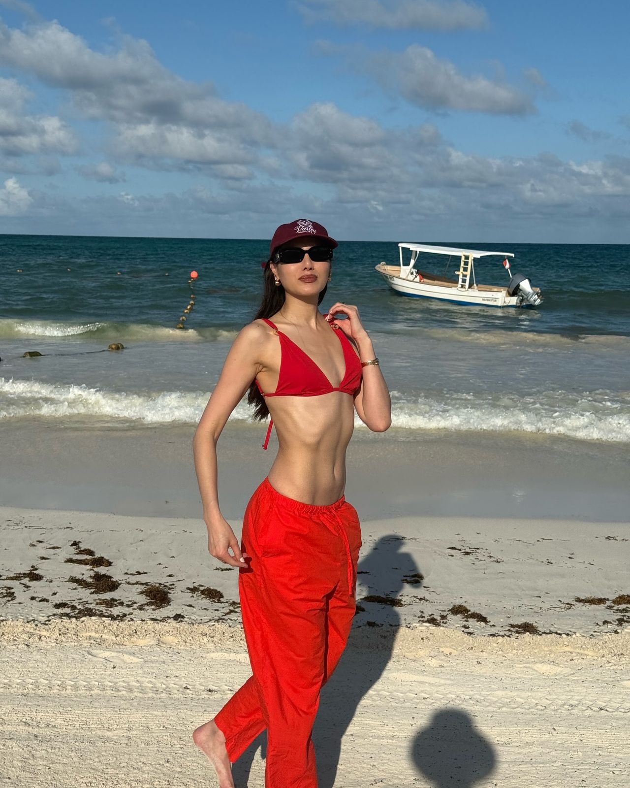 Natalie Lim Suarez - Zella Red Triangle Mid Coverage Solid Bikini Sets | Moeva | Bikini Sets | Each week unveils new pieces—luxury swimwear, fluid resort silhouettes, and elevated summer-to-evening essentials designed to carry you from coastal escapes to city nights.