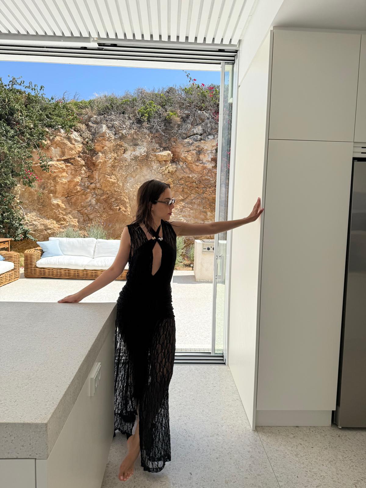 Meredith Black Halter High Waist Satin Bikini Set And Aveline Black Sleeveless Lace Maxi Kaftan | Moeva | Beachwear Dresses | Each week unveils new pieces—luxury swimwear, fluid resort silhouettes, and elevated summer-to-evening essentials designed to carry you from coastal escapes to city nights.
