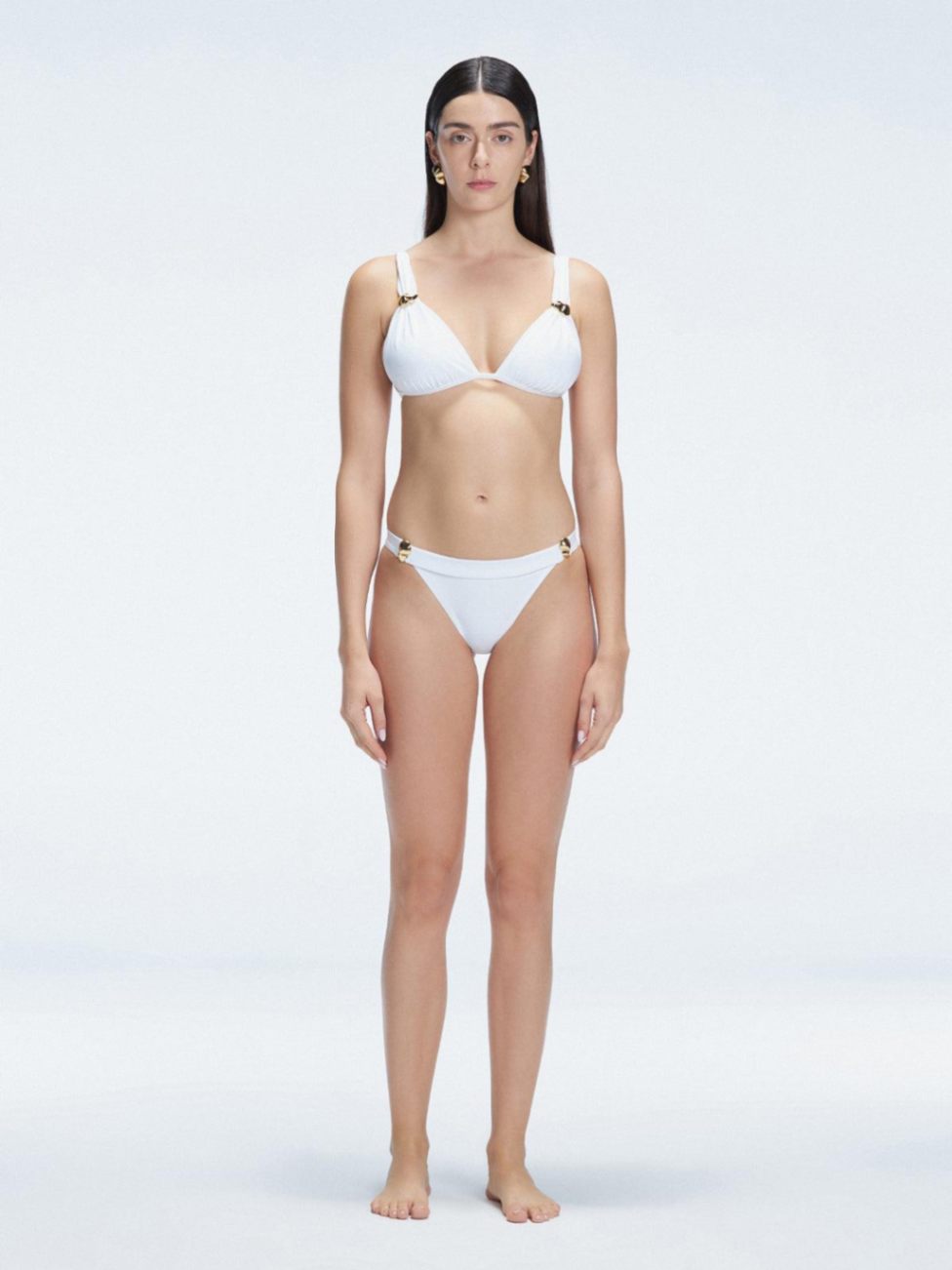 Zella White Mid Coverage Solid Bikini Bottom | Moeva | Bikini Bottom | Each week unveils new pieces—luxury swimwear, fluid resort silhouettes, and elevated summer-to-evening essentials designed to carry you from coastal escapes to city nights.