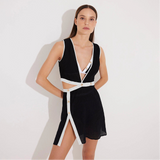 Blanca Black/White Asymmetric Mini Dress with Gold Button Detail | Moeva | Dress | Each week unveils new pieces—luxury swimwear, fluid resort silhouettes, and elevated summer-to-evening essentials designed to carry you from coastal escapes to city nights.