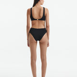 Jasmine Tookes - Honora Black High Neck Swimsuit | Moeva | Swimsuit | Each week unveils new pieces—luxury swimwear, fluid resort silhouettes, and elevated summer-to-evening essentials designed to carry you from coastal escapes to city nights.