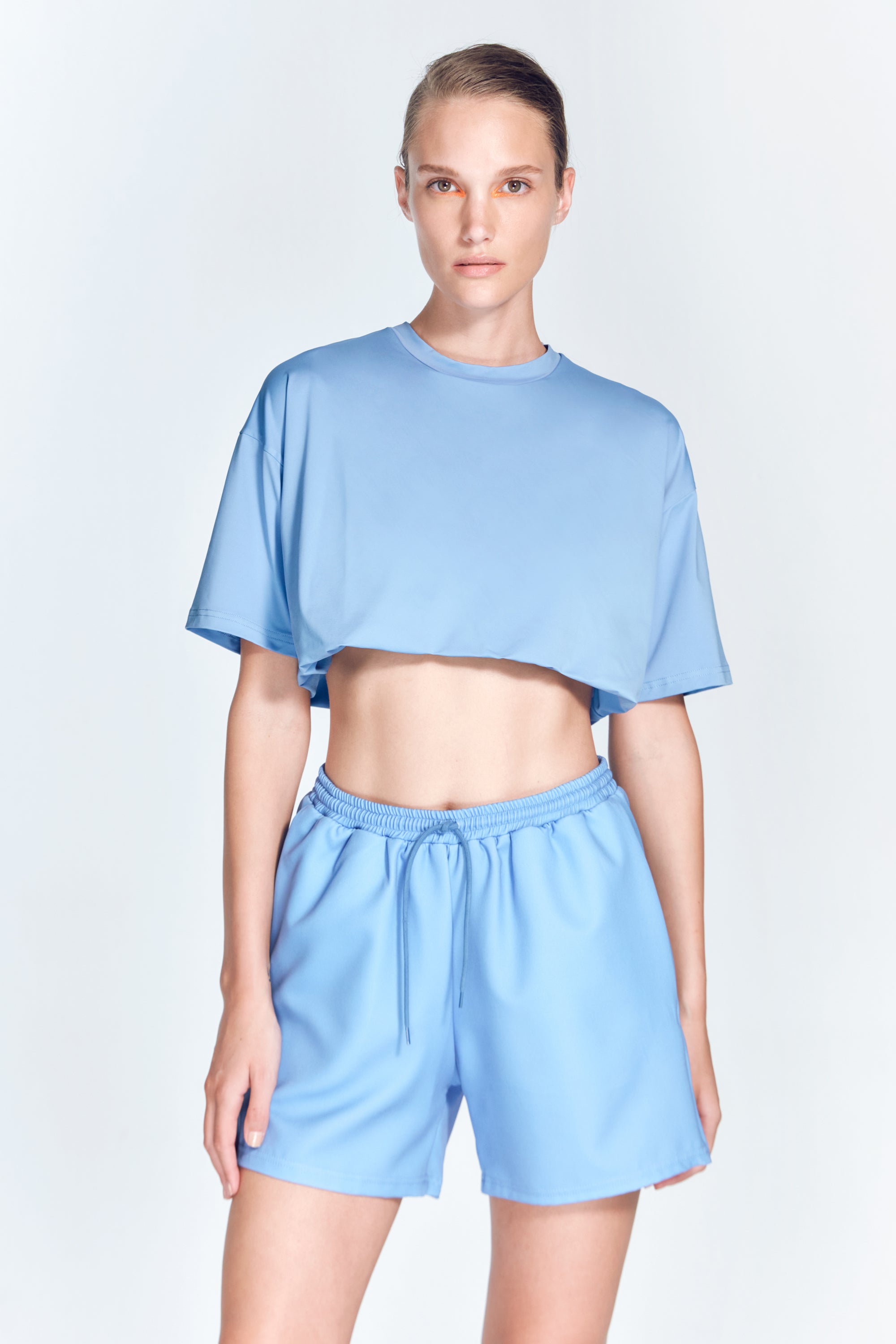 Isolde Blue Top | Moeva | Activewear | Each week unveils new pieces—luxury swimwear, fluid resort silhouettes, and elevated summer-to-evening essentials designed to carry you from coastal escapes to city nights.