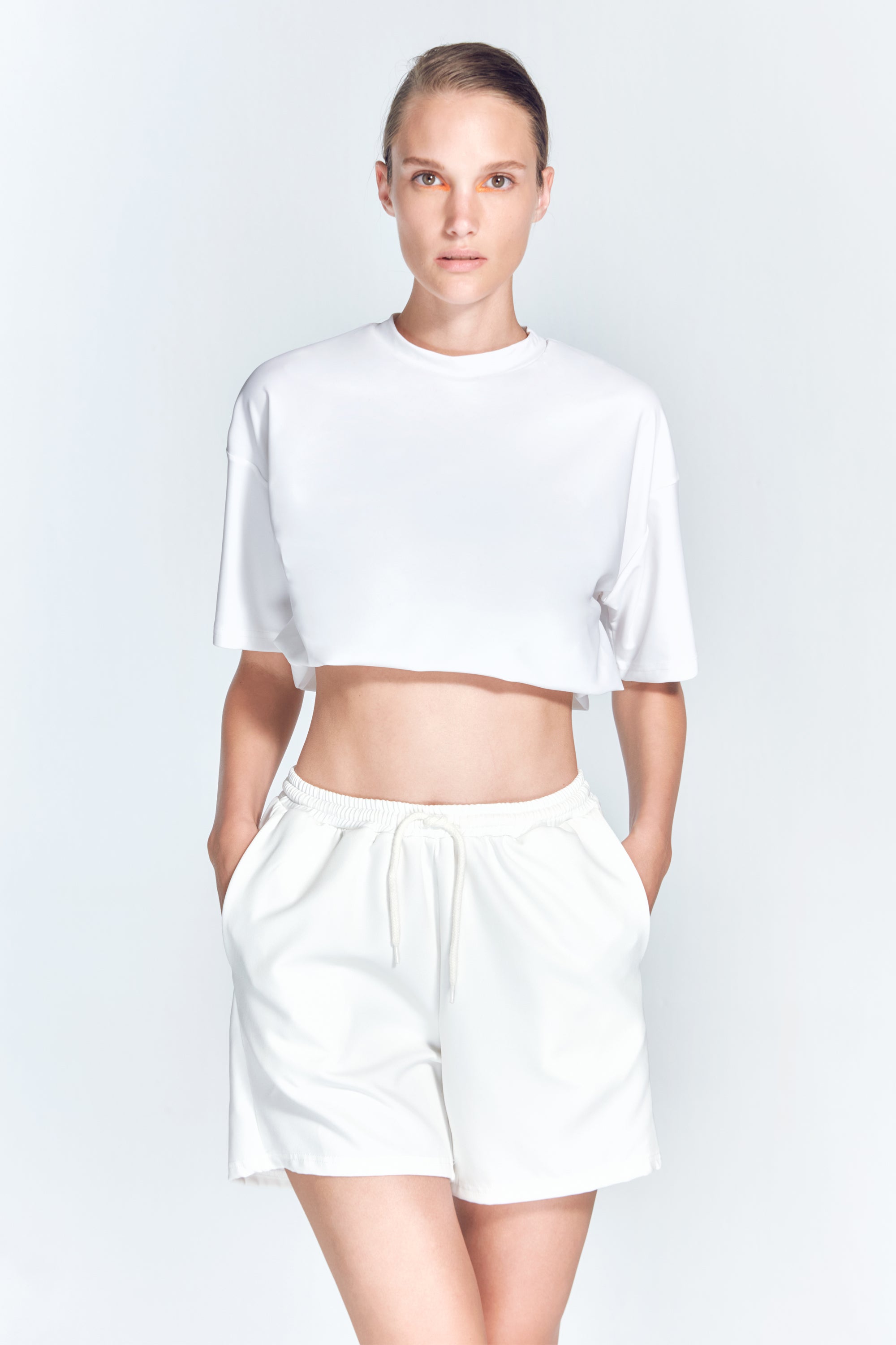 Isolde White Top | Moeva | Activewear | Each week unveils new pieces—luxury swimwear, fluid resort silhouettes, and elevated summer-to-evening essentials designed to carry you from coastal escapes to city nights.