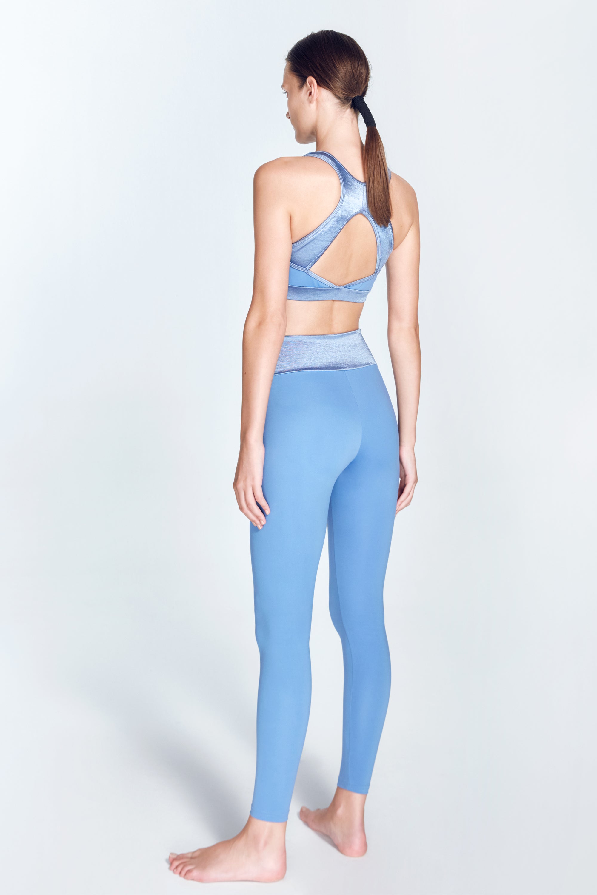 Melina Blue Leggings | Moeva | Activewear | Each week unveils new pieces—luxury swimwear, fluid resort silhouettes, and elevated summer-to-evening essentials designed to carry you from coastal escapes to city nights.