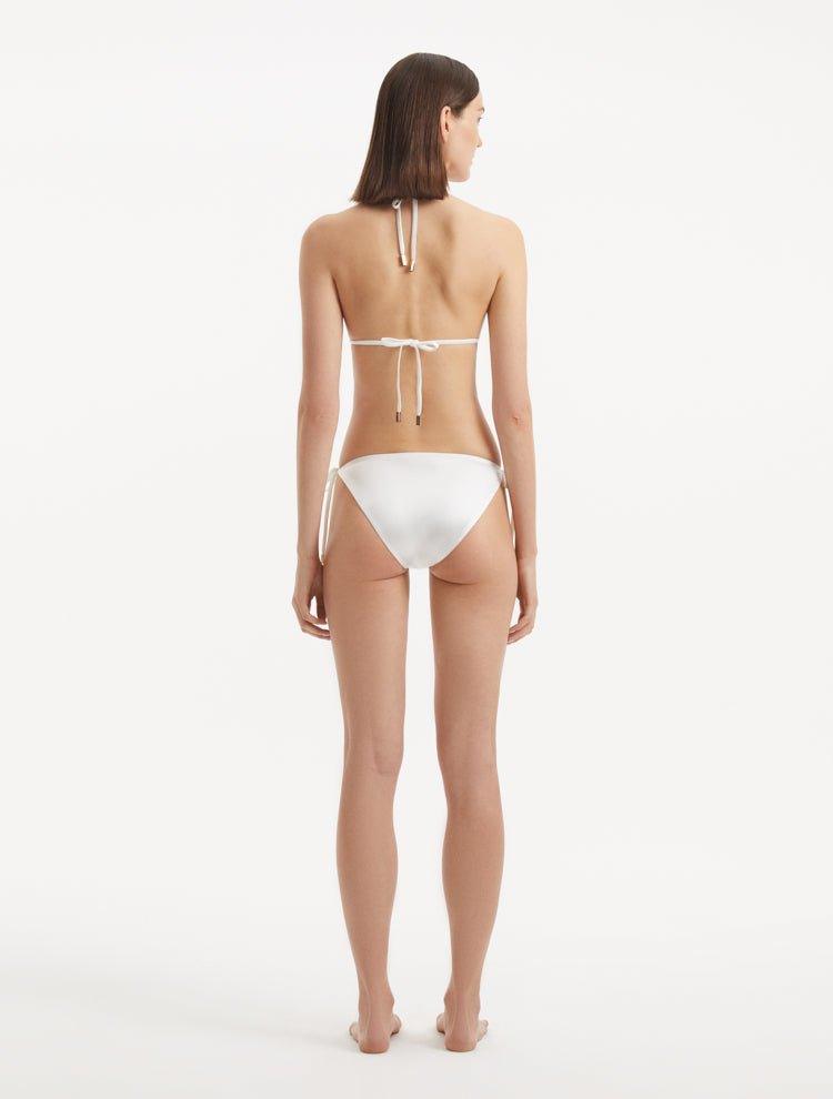 Rhea White Triangle Side Tie Satin Bikini Set | Moeva | | Each week unveils new pieces—luxury swimwear, fluid resort silhouettes, and elevated summer-to-evening essentials designed to carry you from coastal escapes to city nights.