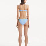 Nina Agdal - Salila Baby Blue Underwired Side Tie Wave Textured Bikini Set - Ephram Blue Wave-Textured Mini Skirt | Moeva | Bikini Set | Each week unveils new pieces—luxury swimwear, fluid resort silhouettes, and elevated summer-to-evening essentials designed to carry you from coastal escapes to city nights.