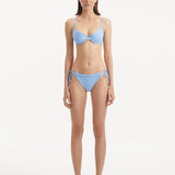 Nina Agdal - Salila Baby Blue Underwired Side Tie Wave Textured Bikini Set - Ephram Blue Wave-Textured Mini Skirt | Moeva | Bikini Set | Each week unveils new pieces—luxury swimwear, fluid resort silhouettes, and elevated summer-to-evening essentials designed to carry you from coastal escapes to city nights.