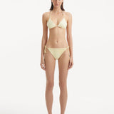 Sarita Yellow Side Tie Bikini Bottom | Moeva | Bikini Bottom | Each week unveils new pieces—luxury swimwear, fluid resort silhouettes, and elevated summer-to-evening essentials designed to carry you from coastal escapes to city nights.