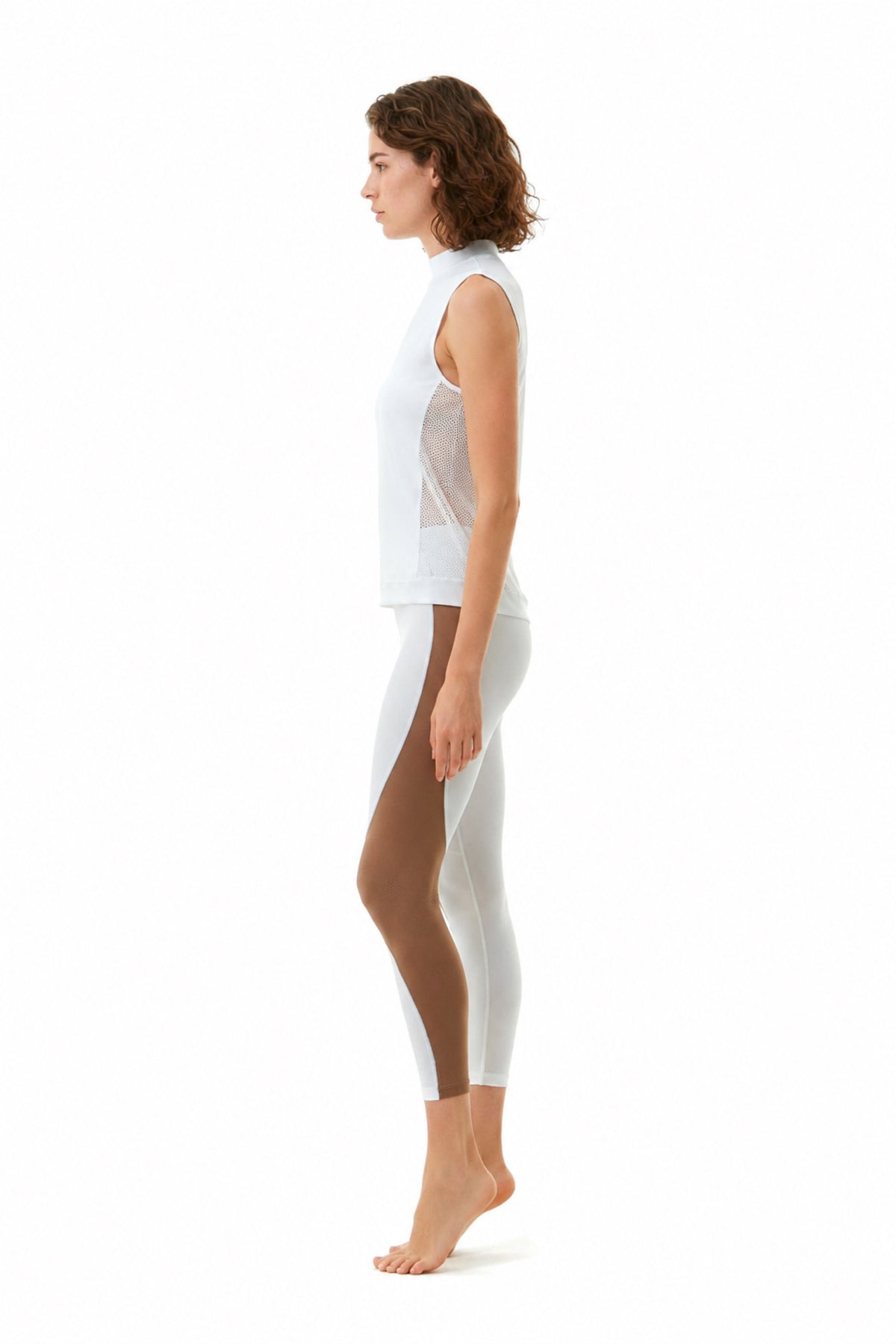 Sienna White Top | Moeva | Sports Tops | Each week unveils new pieces—luxury swimwear, fluid resort silhouettes, and elevated summer-to-evening essentials designed to carry you from coastal escapes to city nights.