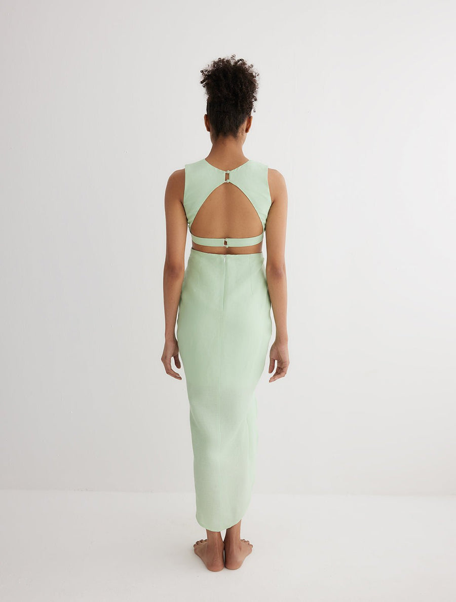 Back View: Model in Adelice Mint Green Dress - MOEVA Luxury Swimwear, Ready to Wear Maxi Dress, Fully Lined, Chic, Linen, MOEVA Luxury Swimwear