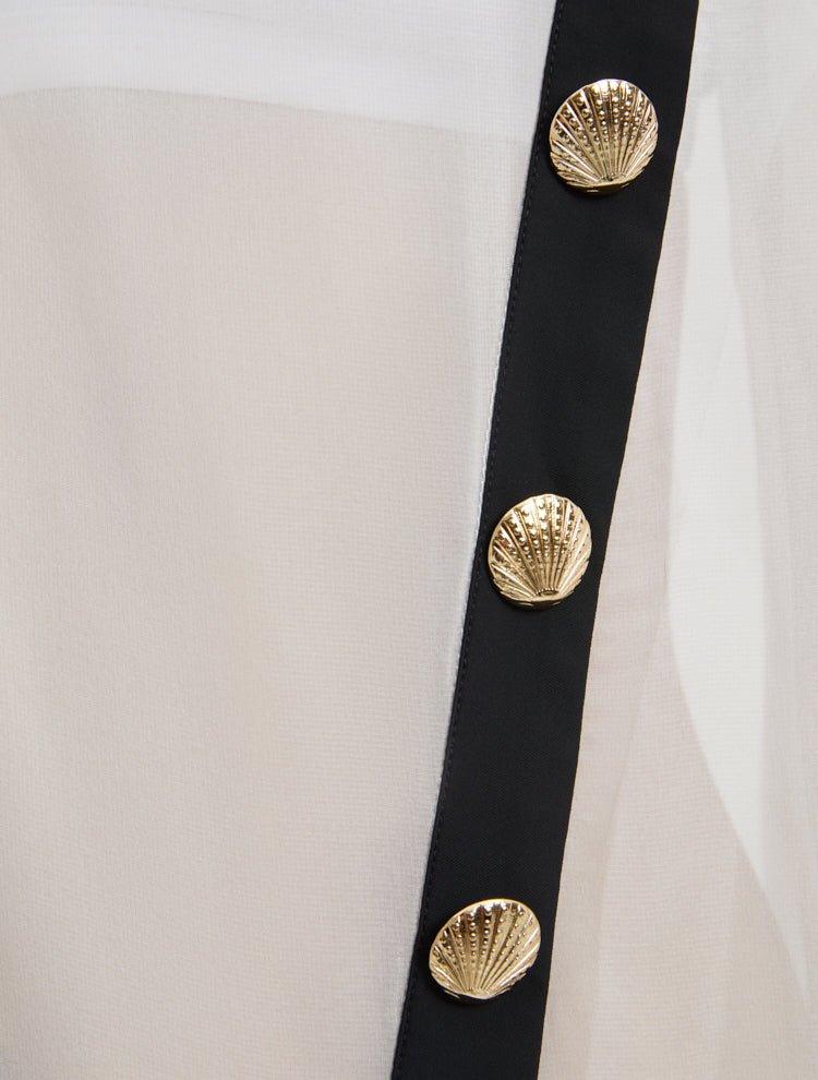 Adora White Sheer Sleeveless Asymmetric Dress with Gold Button Detail | Moeva | Dress | Each week unveils new pieces—luxury swimwear, fluid resort silhouettes, and elevated summer-to-evening essentials designed to carry you from coastal escapes to city nights.