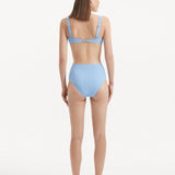 Adva Baby Blue High Waist Textured Bikini Bottom | Moeva | Bikini Bottom | Each week unveils new pieces—luxury swimwear, fluid resort silhouettes, and elevated summer-to-evening essentials designed to carry you from coastal escapes to city nights.