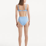 Adva Baby Blue Balconette Textured Bikini Top | Moeva | Bikini Top | Each week unveils new pieces—luxury swimwear, fluid resort silhouettes, and elevated summer-to-evening essentials designed to carry you from coastal escapes to city nights.