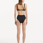 Adva Black High Waist Textured Bikini Bottom | Moeva | Bikini Bottom | Each week unveils new pieces—luxury swimwear, fluid resort silhouettes, and elevated summer-to-evening essentials designed to carry you from coastal escapes to city nights.