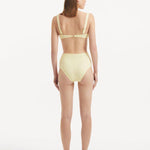 Adva Yellow High Waist Textured Bikini Bottom | Moeva | Bikini Bottom | Each week unveils new pieces—luxury swimwear, fluid resort silhouettes, and elevated summer-to-evening essentials designed to carry you from coastal escapes to city nights.