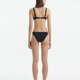 Merve Oflaz - Aeron Black V Neck Textured Mid Coverage Bikini Set | Moeva | Bikini Set | Each week unveils new pieces—luxury swimwear, fluid resort silhouettes, and elevated summer-to-evening essentials designed to carry you from coastal escapes to city nights.