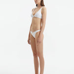 Aeron White V Neck Textured Bikini Top | Moeva | Bikini Top | Each week unveils new pieces—luxury swimwear, fluid resort silhouettes, and elevated summer-to-evening essentials designed to carry you from coastal escapes to city nights.