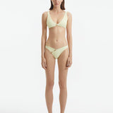 Aeron Yellow Mid Coverage Bikini Bottom | Moeva | Bikini Bottom | Each week unveils new pieces—luxury swimwear, fluid resort silhouettes, and elevated summer-to-evening essentials designed to carry you from coastal escapes to city nights.