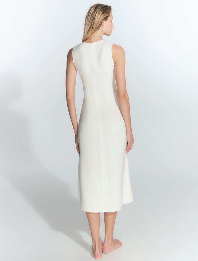 Back View: Model in Amiyah White Dress - MOEVA Luxury Swimwear, Mid-Length, Lightweight Fabric, Asymmetrical Hemline, Ready to Wear Maxi Dress, Fully Lined, Chic, Soft Touch Fabric, MOEVA Luxury Swimwear