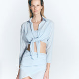 Antonia Gingham Baby Blue High-Waist Wrap Mini Skirt | Moeva | Skirt | Each week unveils new pieces—luxury swimwear, fluid resort silhouettes, and elevated summer-to-evening essentials designed to carry you from coastal escapes to city nights.
