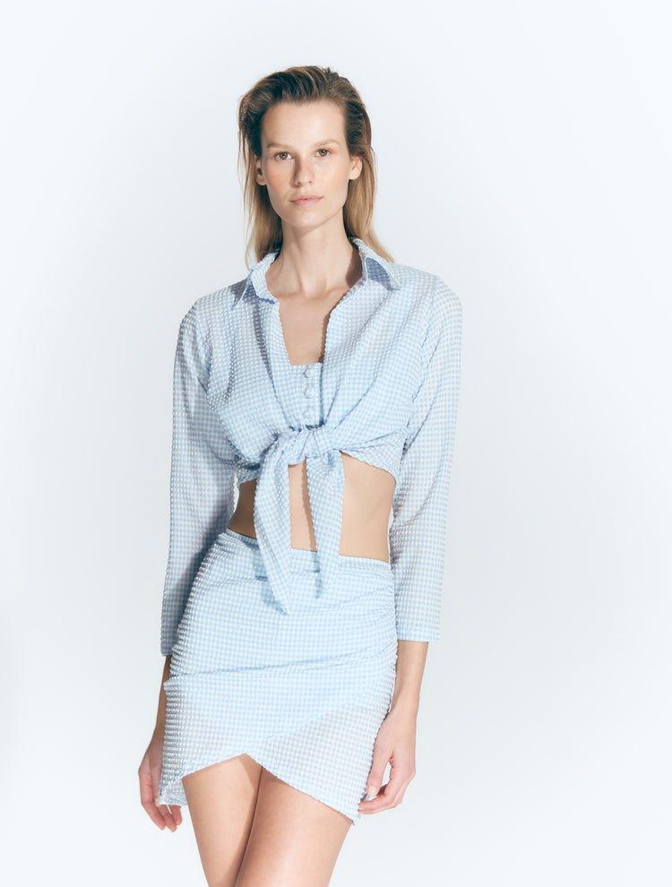 Antonia Gingham Baby Blue High-Waist Wrap Mini Skirt | Moeva | Skirt | Each week unveils new pieces—luxury swimwear, fluid resort silhouettes, and elevated summer-to-evening essentials designed to carry you from coastal escapes to city nights.