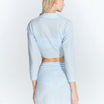 Antonia Gingham Baby Blue High-Waist Wrap Mini Skirt | Moeva | Skirt | Each week unveils new pieces—luxury swimwear, fluid resort silhouettes, and elevated summer-to-evening essentials designed to carry you from coastal escapes to city nights.