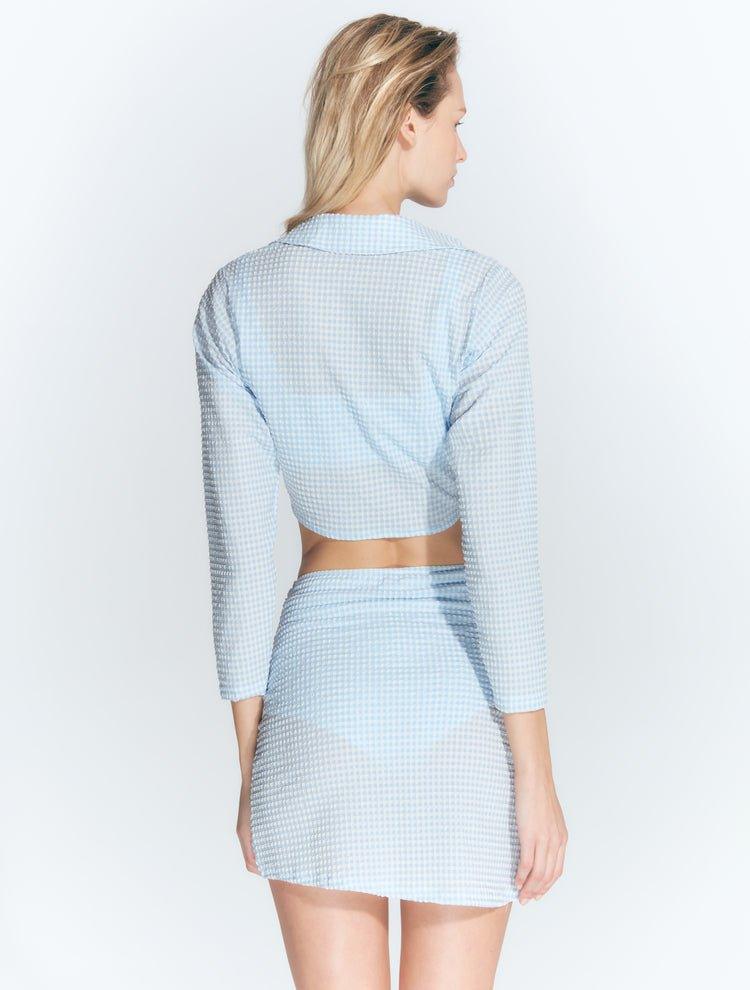 Antonia Gingham Baby Blue High-Waist Wrap Mini Skirt | Moeva | Skirt | Each week unveils new pieces—luxury swimwear, fluid resort silhouettes, and elevated summer-to-evening essentials designed to carry you from coastal escapes to city nights.