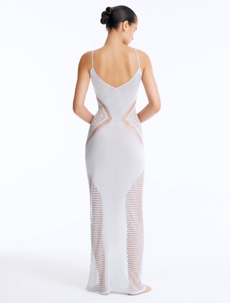 Back View: Azalea Silver Dress on Model - Sleeveless, Close Fit, Adjustable Straps, Metal Moeva Logo Plaque At The Back, MOEVA Luxury Swimwear