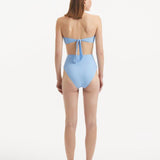 Baia Baby Blue Bandeau Textured Bikini Top | Moeva | Bikini Top | Each week unveils new pieces—luxury swimwear, fluid resort silhouettes, and elevated summer-to-evening essentials designed to carry you from coastal escapes to city nights.