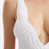 Natalie Lim Suarez - Breena White V Neck Swimsuit | Moeva | Swimsuit | Each week unveils new pieces—luxury swimwear, fluid resort silhouettes, and elevated summer-to-evening essentials designed to carry you from coastal escapes to city nights.