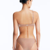 Calix Bronze One Shoulder Bikini Top | Moeva | Bikini Top | Each week unveils new pieces—luxury swimwear, fluid resort silhouettes, and elevated summer-to-evening essentials designed to carry you from coastal escapes to city nights.