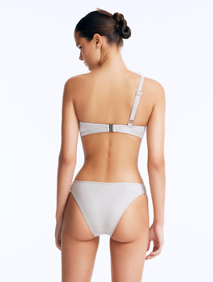 Calix Silver One Shoulder Bikini Top | Moeva | Bikini Top | Each week unveils new pieces—luxury swimwear, fluid resort silhouettes, and elevated summer-to-evening essentials designed to carry you from coastal escapes to city nights.