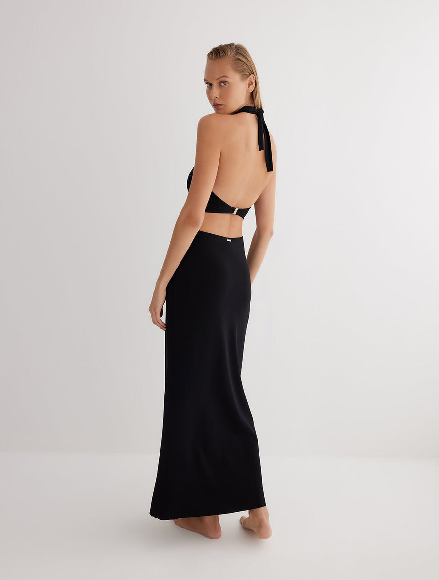 Back View: Model in Clemence Black Dress - MOEVA Luxury Swimwear, Ready to Wear, Unlined, Chic, Knitted, Maxi Dress, MOEVA Luxury Swimwear 
