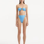 Clyde Baby Blue High Waist Satin Bikini Bottom | Moeva | Bikini Bottom | Each week unveils new pieces—luxury swimwear, fluid resort silhouettes, and elevated summer-to-evening essentials designed to carry you from coastal escapes to city nights.