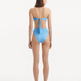 Clyde Baby Blue Bandeau Satin Bikini Top | Moeva | Bikini Top | Each week unveils new pieces—luxury swimwear, fluid resort silhouettes, and elevated summer-to-evening essentials designed to carry you from coastal escapes to city nights.