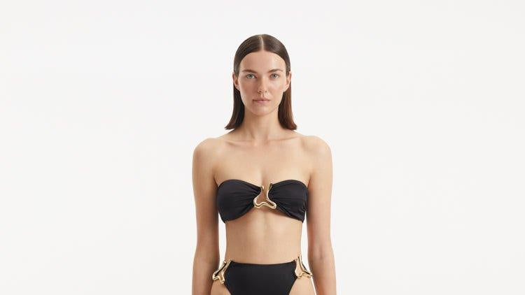 Gina Drewalowski-Clyde Black Bandeau High Waist Satin Bikini Set | Moeva | Bikini Sets | Each week unveils new pieces—luxury swimwear, fluid resort silhouettes, and elevated summer-to-evening essentials designed to carry you from coastal escapes to city nights.