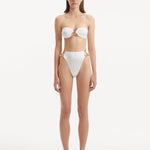 Clyde White High Waist Satin Bikini Bottom | Moeva | Bikini Bottom | Each week unveils new pieces—luxury swimwear, fluid resort silhouettes, and elevated summer-to-evening essentials designed to carry you from coastal escapes to city nights.