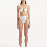 Clyde White High Waist Satin Bikini Bottom | Moeva | Bikini Bottom | Each week unveils new pieces—luxury swimwear, fluid resort silhouettes, and elevated summer-to-evening essentials designed to carry you from coastal escapes to city nights.