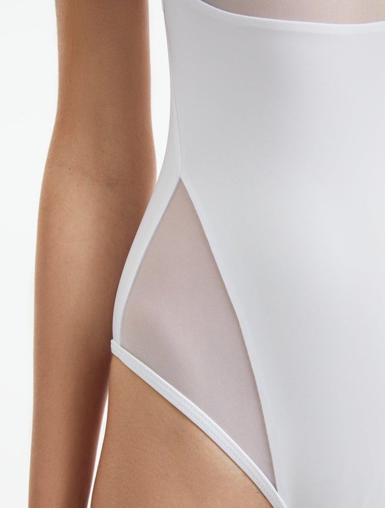 Darya White Scoop Neck Swimsuit | Moeva | Swimsuit | Each week unveils new pieces—luxury swimwear, fluid resort silhouettes, and elevated summer-to-evening essentials designed to carry you from coastal escapes to city nights.