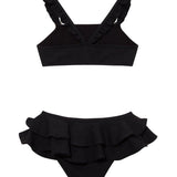 Dassy Black Ruffle Strap Kids Bikini Set with Layered Skirt | Moeva | Bikini Set | Each week unveils new pieces—luxury swimwear, fluid resort silhouettes, and elevated summer-to-evening essentials designed to carry you from coastal escapes to city nights.