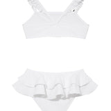 Dassy White Ruffle Strap Kids Bikini Set with Layered Skirt | Moeva | Kids Bikinis | Each week unveils new pieces—luxury swimwear, fluid resort silhouettes, and elevated summer-to-evening essentials designed to carry you from coastal escapes to city nights.
