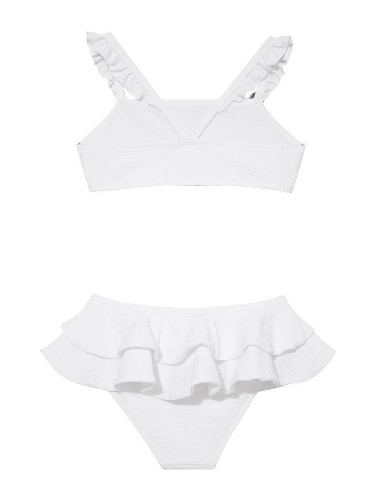 Dassy White Ruffle Strap Kids Bikini Set with Layered Skirt | Moeva | Kids Bikinis | Each week unveils new pieces—luxury swimwear, fluid resort silhouettes, and elevated summer-to-evening essentials designed to carry you from coastal escapes to city nights.