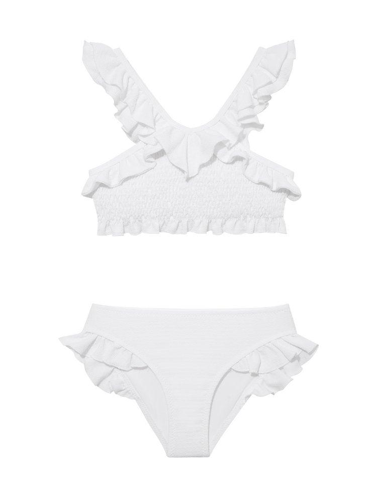 Effy White Ruffle Strap and Trim Kids Bikini Set | Moeva | Kids Bikinis | Each week unveils new pieces—luxury swimwear, fluid resort silhouettes, and elevated summer-to-evening essentials designed to carry you from coastal escapes to city nights.
