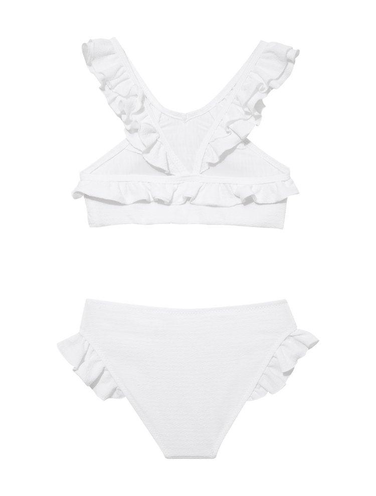 Effy White Ruffle Strap and Trim Kids Bikini Set | Moeva | Kids Bikinis | Each week unveils new pieces—luxury swimwear, fluid resort silhouettes, and elevated summer-to-evening essentials designed to carry you from coastal escapes to city nights.