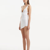 Sober Magazine - Breena White V Neck Swimsuit - Ephram White Wave-Textured Mini Skirt | Moeva | Swimsuit | Each week unveils new pieces—luxury swimwear, fluid resort silhouettes, and elevated summer-to-evening essentials designed to carry you from coastal escapes to city nights.