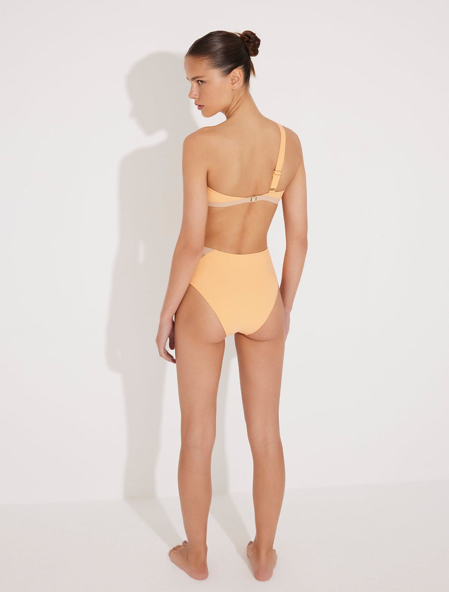 Back View: Model in Etta Orange/Nude Bikini Top - MOEVA Luxury Swimwear, Gold Clasps at the Back, Adjustable Strap, Special Lycra Xtralife Certificate, MOEVA Luxury Swimwear 